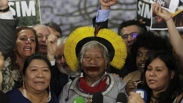 Brazilian indigenous chief Raoni Metuktire attends a meeting with politicians and other organisations in the Brazilian Congress on September 25 .