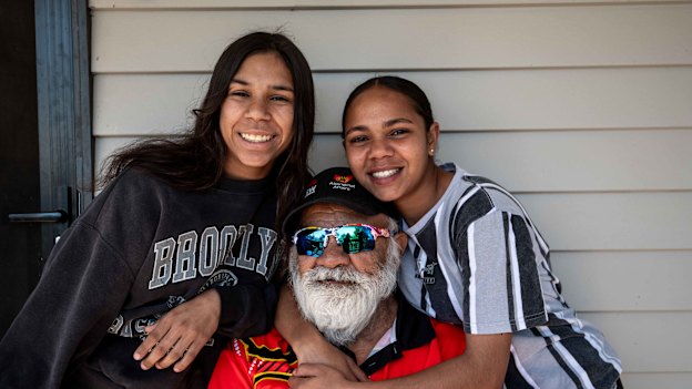 Wilcannia elder William Murray, a signatory to the Uluru Statement from the Heart, with his granddaughters Kyanna (left) and Temmiah (right). 