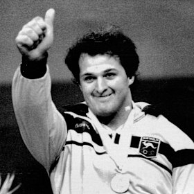 Dean Lukin after receiving the Olympic super heavyweight weightlifting gold medal.