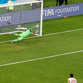 Iran's Karim Ansarifard shows Ronaldo how it's done and equalises for Iran.