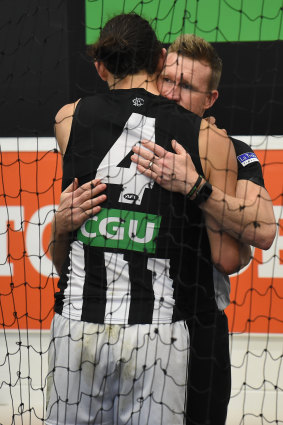 Collingwood coach Nathan Buckley with ruckman Brody Grundy after the game.