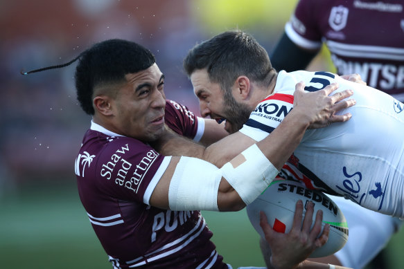 James Tedesco (right) had his best game in weeks in the famous red, white and blue of the Roosters.