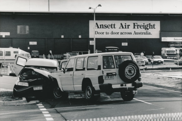 July 28, 1992: police special operations group (right) smash into the bandits' panel van at Melbourne Airport.