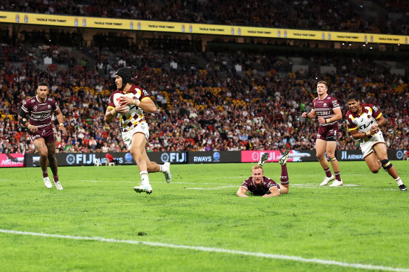 Brendan Piakura beats Daly Cherry-Evans to open the scoring.