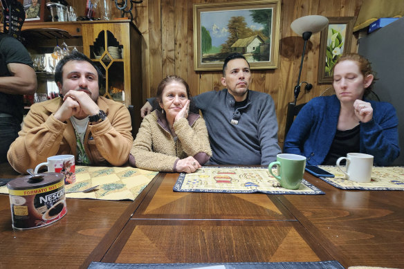Jimmy Thyden, second from right, sits with his wife, Johannah Thyden, right, his birth mother Maria Angelica Gonzalez, second from left, his brother Jonathan Gonzalez in Valdivia, Chile. 