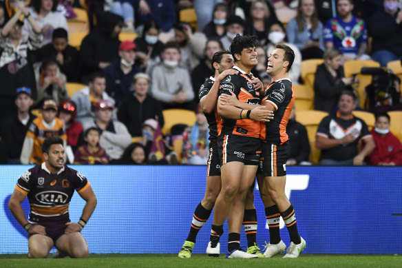 The Tigers were staring down the barrel of another embarrassing loss but bounced back to take the points at Suncorp.