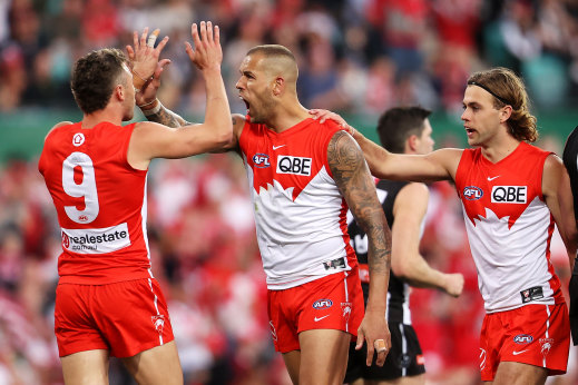 Lance Franklin celebrates kicking a goal against Collingwood.