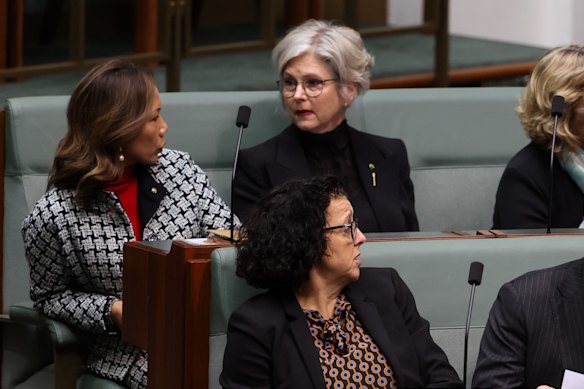 Dai Le (left) with Helen Haines (right) in the House of Representatives sitting behind fellow independent Monique Ryan.