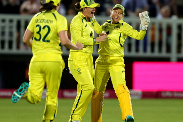 Jess Jonassen (centre) celebrates with her Australian teammates after catching Sophia Dunkleyin the T20 match at Lord’s.