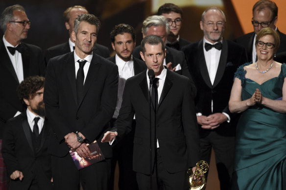 David Benioff, centre left, and DB Weiss accept the award for outstanding drama series for Game Of Thrones at last month's Emmy Awards. 