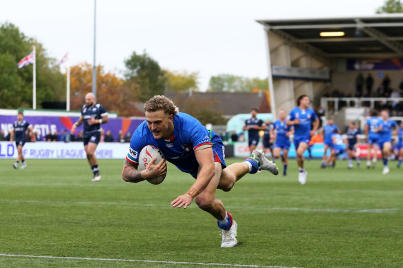 Jake Maizen goes over the line to seal a hat-trick in Newcastle.