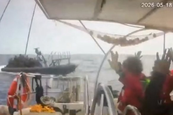 Questa ripresa dalle riprese della CCTV mostra gli attivisti a bordo di una flottiglia con le mani alzate mentre una barca si avvicina a una delle oltre 50 navi salpate dal porto di Marmaris, in Turchia, la scorsa settimana.