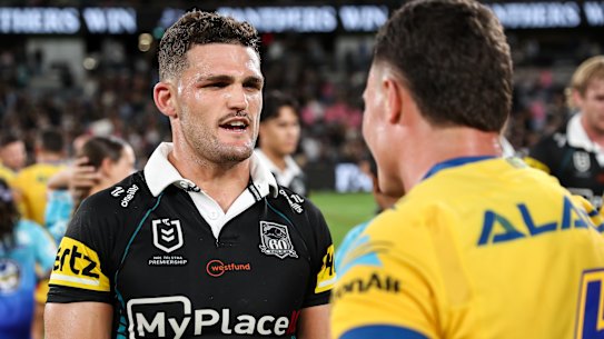 Nathan Cleary talks with Mitchell Moses at fulltime.