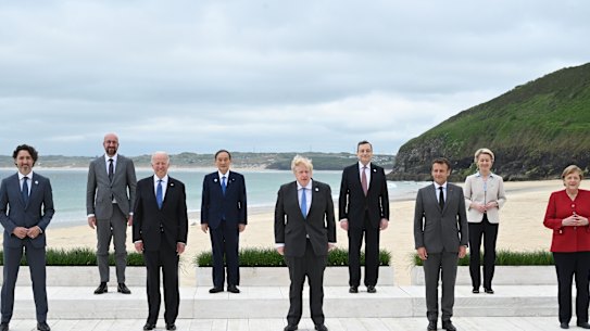 G7 leaders pose for the obligatory ‘family photo’ in Carbis Bay.