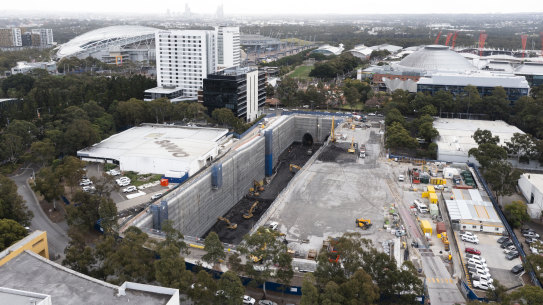 Excavators at work Wednesday on the site of a train station at Sydney Olympic Park for the Metro West line. 