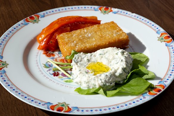 Smoked trout, hash brown and fresh cheese.