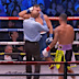Noel Mikaelian complains to the referee mid-fight against Jai Opetaia.