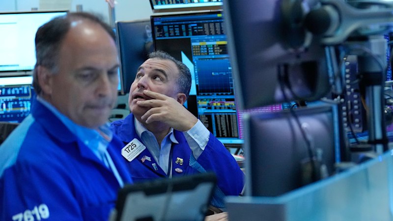 ASX turns lower as banks decline, gold miners shine; Wall Street hits record