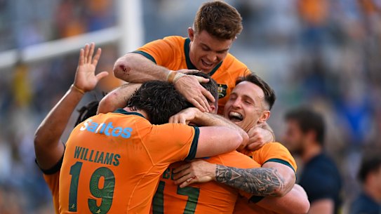 The Wallabies celebrate a great win in Townsville.