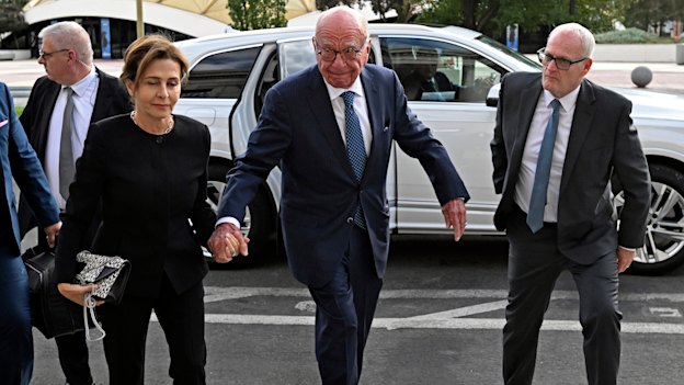 Rupert Murdoch and his wife, Elena Zhukova Murdoch, arrive at the Second Judicial District Court in Reno.