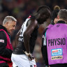 Port Adelaide’s Allir Aliir leaves the ground after the collision with teammate Lachie Jones on saturday night.