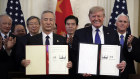 Liu He and Donald Trump with the phase-one trade accord. Critics charge that the deal amounts to nothing more than  "managed trade".