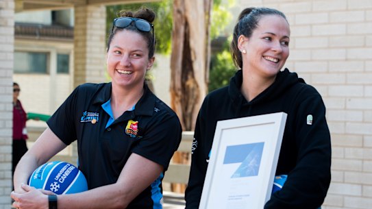 Kelsey Griffin and Keely Froling on hand as the Canberra Capitals are announced as 2019 Canberra Citizen of the year.