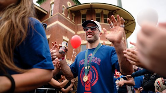 Still the No. 1: James Tedesco is swarmed by fans at the SCG on Monday.