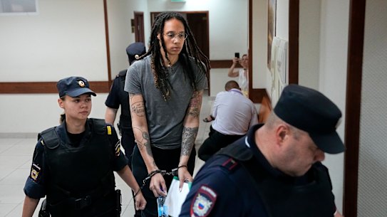 WNBA star and two-time Olympic gold medallist Brittney Griner is led into court in Khimki, just outside Moscow, on Thursday.