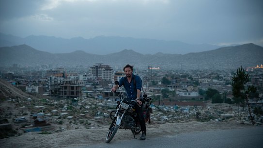 Afghanistan “became my identity”, says Andrew Quilty, pictured in front of Kabul’s Wazir Abad cemetery.