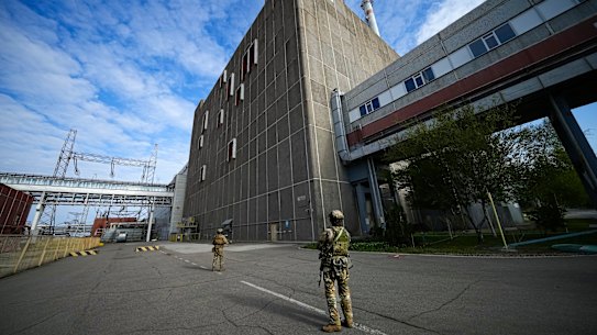 Russian soldiers guard an area of the Zaporizhzhia nuclear power station in south-eastern Ukraine.