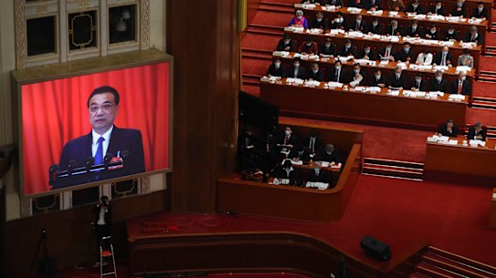 Chinese Premier Li Keqiang delivers the government work report during the opening session of China's National People's Congress. 