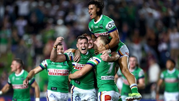 The Raiders celebrate victory at Brookvale.