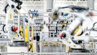 Robotic arms swirling into action at the Zeekr factory’s body shop in Ningbo, China.
