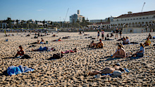 Beachgoers soak up the sun at Bondi Beach in June.