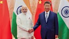 In this photo provided by Indian Prime Minister’s Office, Indian Prime Minister Narendra Modi, left, and Chinese President Xi Jinping shake hand before their meeting on the sidelines of the Shanghai Cooperation Organization (SCO) summit in Tianjin, China Sunday, Aug. 31, 2025. (Indian Prime Minister’s Office via AP)