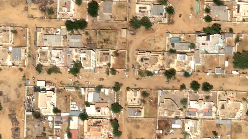 Visible from space, bloodied sands expose massacre of thousands after besieged city falls