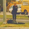 SOG police arrest Stephen Asling after three bandits tried to escape with $1million from the Melbourne Airport in 1992. One of the bandits, Normie Lee, was shot dead.