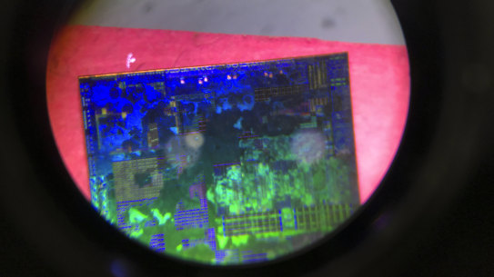 A Chinese microchip is seen through a microscope.