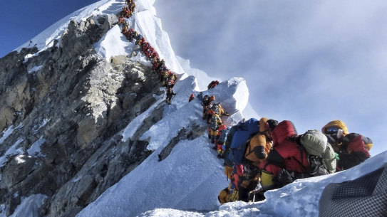 Climbers on Everest on May 22 this year. Long delays increase the risk that climbers will run out of oxygen: “If you’ve got to wait in a bloody queue, you’re knocking on heaven’s door,” says Australian climber Greg Mortimer.