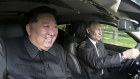 Bromance: Russia’s President Vladimir Putin, right, drives a car in Pyongyang, with North Korean leader Kim Jong Un on Wednesday 