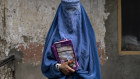 Arefeh 40-year-old, an Afghan woman leaves an underground school, in Kabul, Afghanistan, Saturday, July 30, 2022.