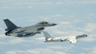 Taiwanese jet shadows a bomber from mainland China in airspace south of the island. 