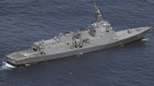 A Japanese Maritime Self-Defence Force vessel sails near the site of a crash on Sunday.