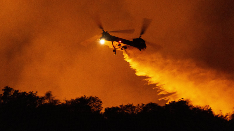 More evacuations as fire changes direction, posing new threat to Los Angeles