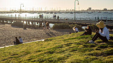 Late afternoon sunshine at St Kilda beach on Saturday.