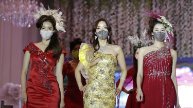 Models wearing face masks during a fashion show in South Korea in July.