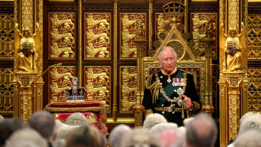 Prince Charles sits by the Imperial State Crown as he delivers the Queen’s Speech during the state opening of parliament at the House of Lords in London.