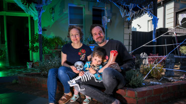 Josh Weier and Rhiannon Devine, pictured with their daughter Olwyn, love Halloween.
