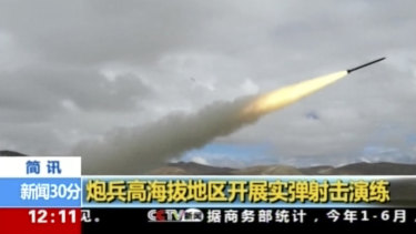 A rocket is launched during a live-fire drill by the Chinese army in China's Tibet Autonomous Region that borders India.